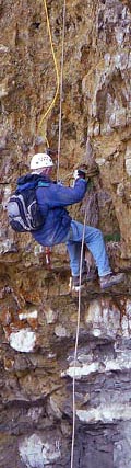 Bob Warden rappels down Pointe du Hoc cliffs in 2008.
