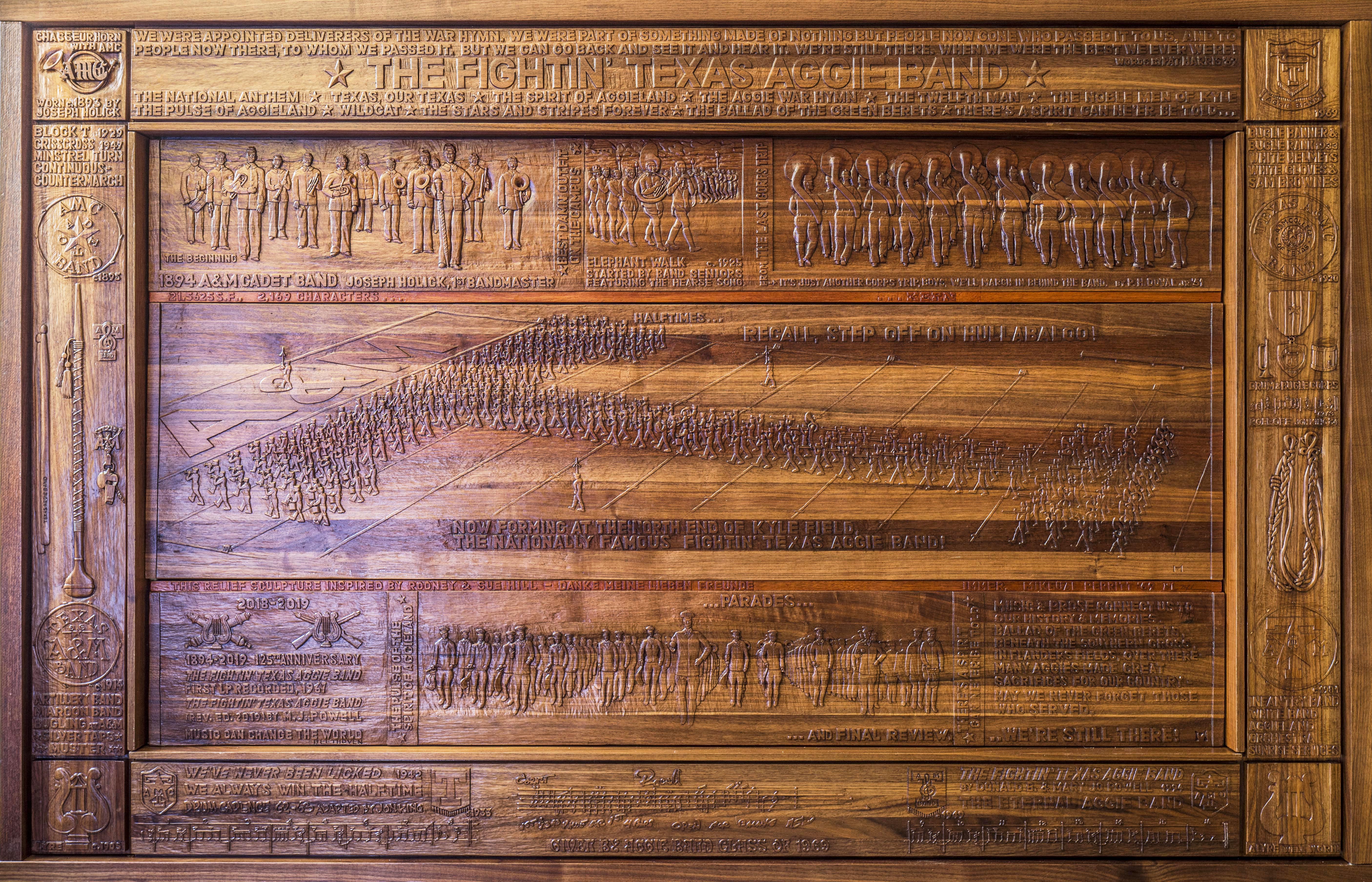 The full walnut and mahogany wood relief sculpture hand created by Mikeual Perritt. 