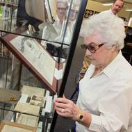 Family members view Ernest Langford collection at TRC