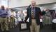 Rodney Hill speaks after receiving a plaque denoting his status as a 2011 Piper Professor during a reception at the Wright Gallery.