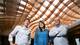 From left are Josh Canez, Lauren Hensley and Nick Schaider, who designed and fabricated "Plywood Mesh #002" with the help of the CNC router at the college’s digital fabrication facility.